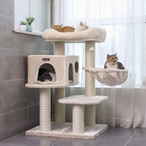 A sturdy adjustable beige carpeted cat tree can be what the doctor ordered when you are trying to figure out how to catify your space.