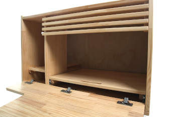 You can easily see how this modern litter box furniture opens so that you can clean your cats litter, and access extra supplies.