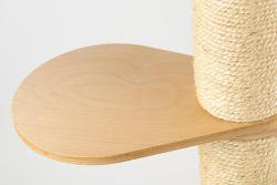 The birch wood step on this minimalist and modern luxury cat tree from Tuft + Paw.